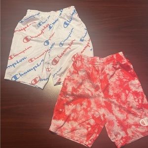 2 pairs of Youth Medium Champion mesh shorts.